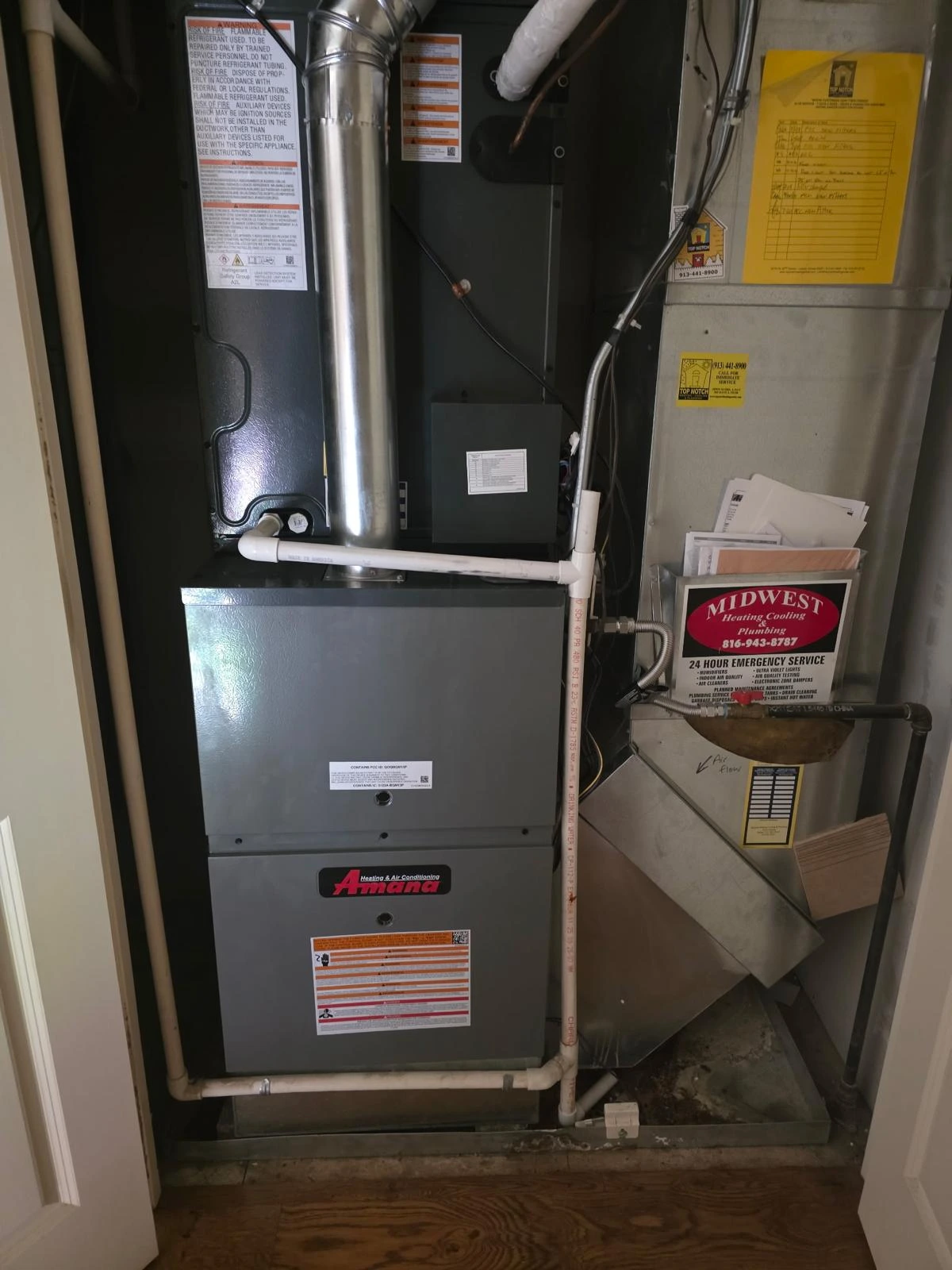 Amana gas furnace installation inside an equipment closet